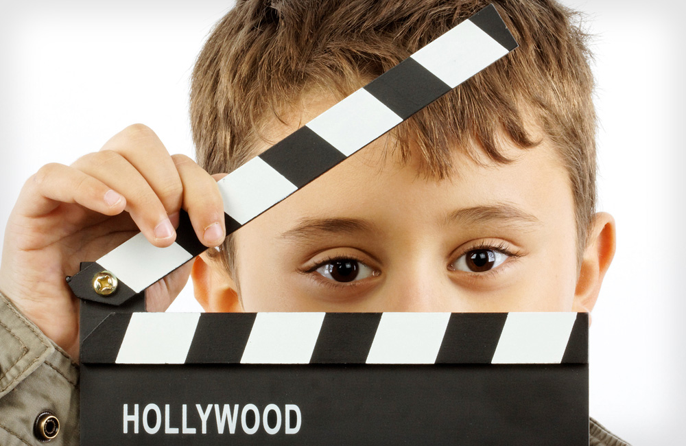 Little boy with film slate